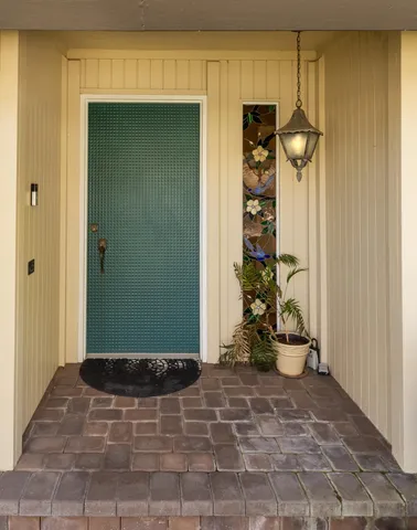 a view of a entryway door of the house