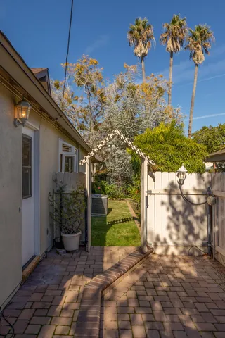 a outdoor view of a house with a backyard