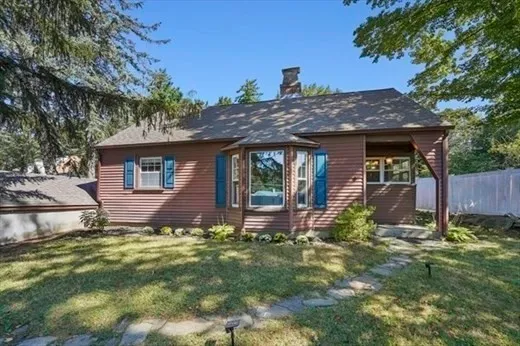 a front view of house with yard