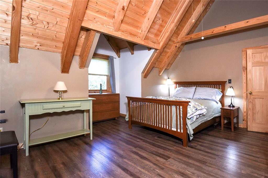 119 Kelly Road Washington, PA 15301 - Photo 15 of 25 One of the guest bedrooms has a vaulted ceiling, hardwood flooring and both natural lighting and ceiling lighting