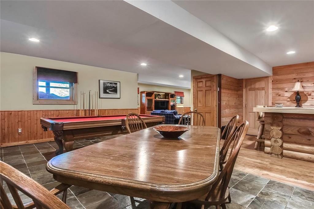 119 Kelly Road Washington, PA 15301 - Photo 20 of 25 Another view of the Game Room shows the wooden half wall that surrounds the room. Recessed lighting also gives the rest of the room a nice warm touch