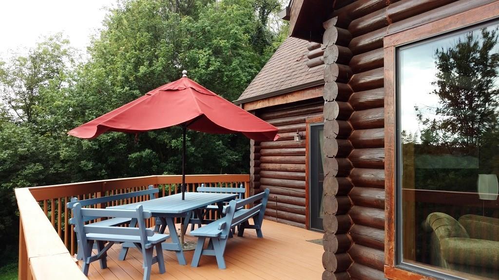 119 Kelly Road Washington, PA 15301 - Photo 22 of 25 The exterior deck gives you the opportunity to view the property. The treed 2 acres of land will make you feel like the luckiest person on earth to have found such a wonderful home!
