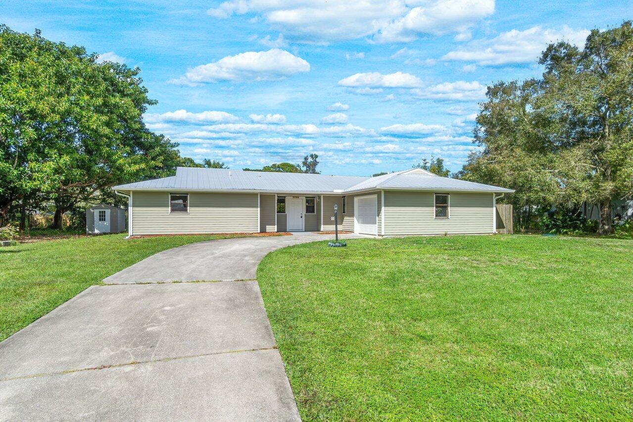 7106 Pensacola Road Fort Pierce, FL 34951 - Photo 1 of 34 001-7106PensacolaRoad-FortPierce-FL-3495