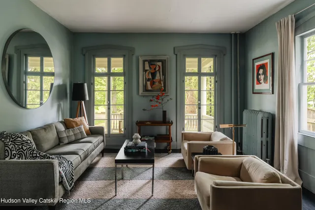 a living room with furniture and a window