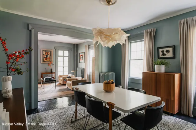 a dining room with table and chair