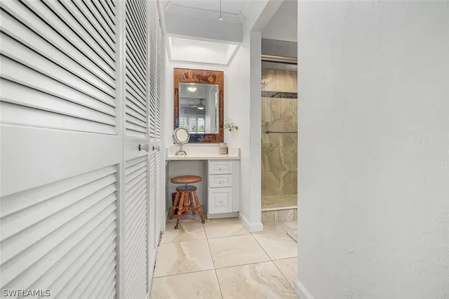 a view of a kitchen from the hallway