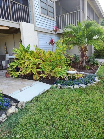 a view of a back yard of the house