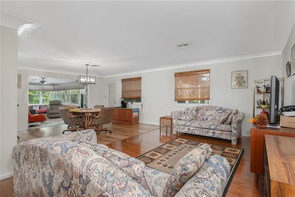 a living room with furniture and a couch