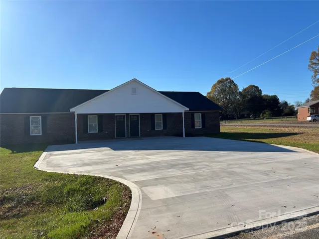 a house view with a garden space