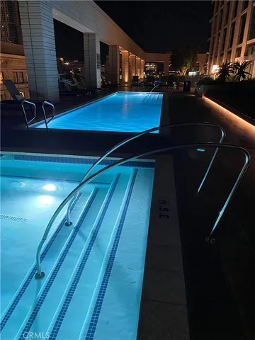 a view of a terrace with outdoor seating and trees