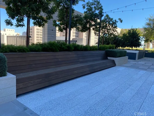 a view of kitchen with window and cabinets