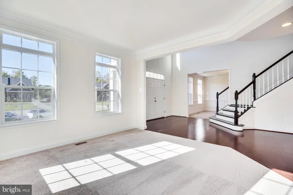 a view of a living room with windows