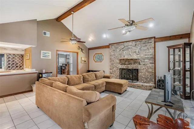 a hallway with a sink and cabinets