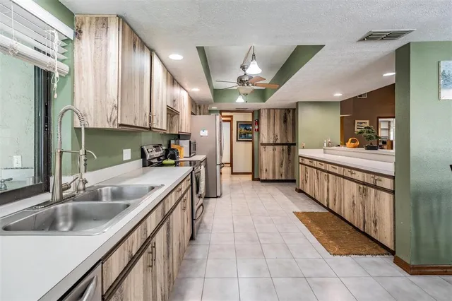 a view of workspace with furniture and windows