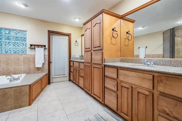 a view of a livingroom with a chair and dining table