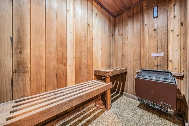 a room with gym equipment and equipment