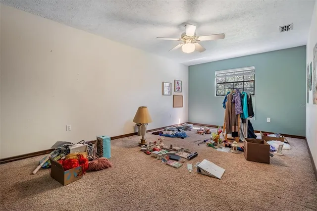 an aerial view of a house with outdoor space and street view