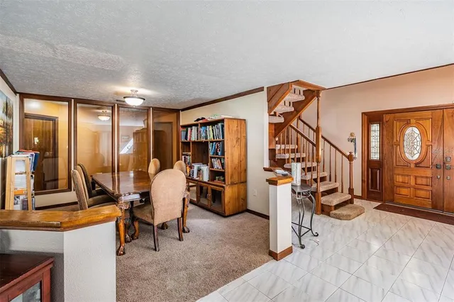 a view of a livingroom with furniture and window