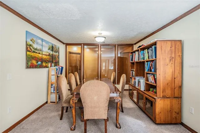 a view of a livingroom with furniture and window
