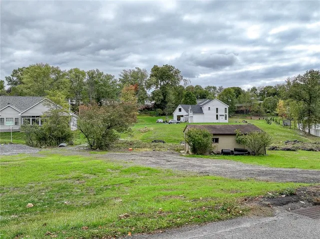 a view of a house with a big yard