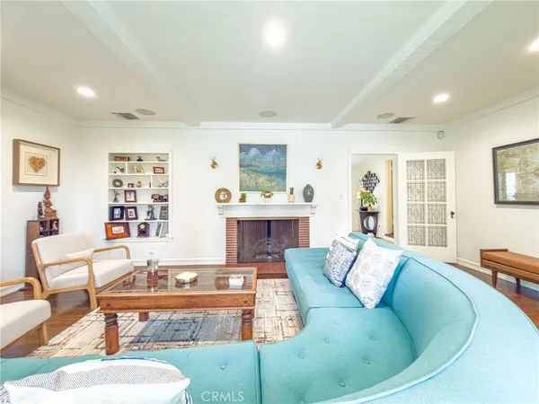 a living room with furniture and a table
