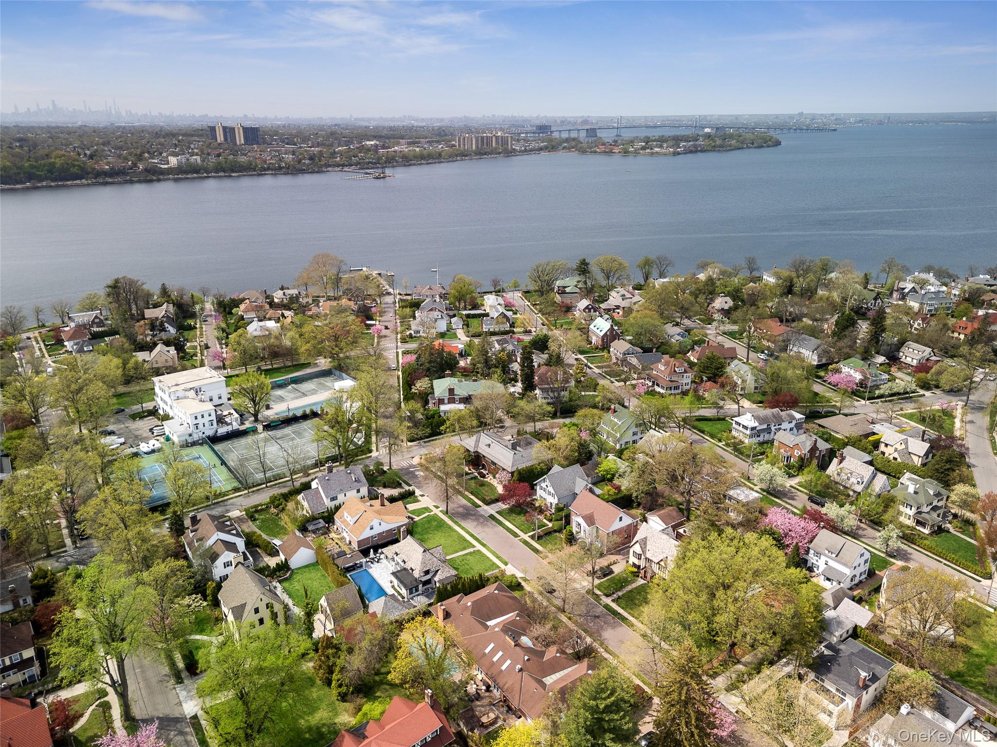 216 Beverly Road Queens, NY 11363 - Photo 22 of 50 an aerial view of a houses with a lake view