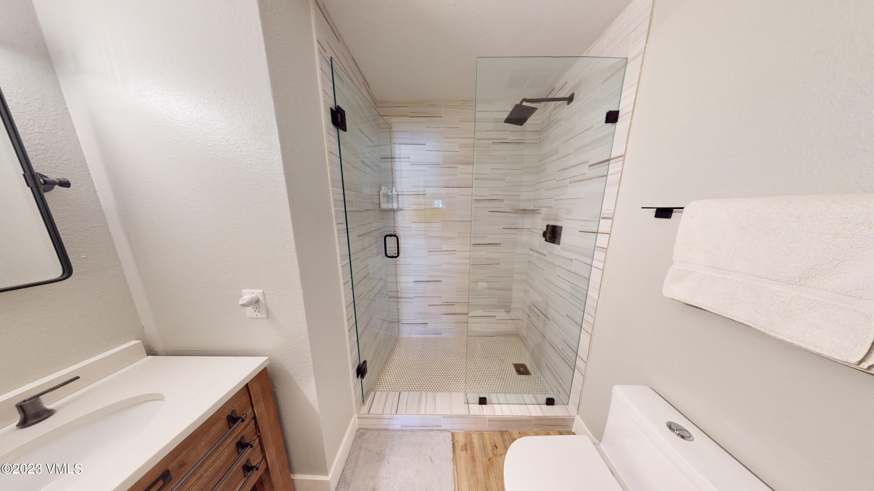 3971 Bighorn, Unit 7N Vail, CO 81657 - Photo 9 of 19 a bathroom with a sink toilet and shower