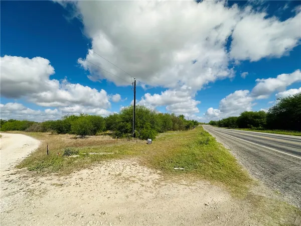 a view of a golf course with a lake