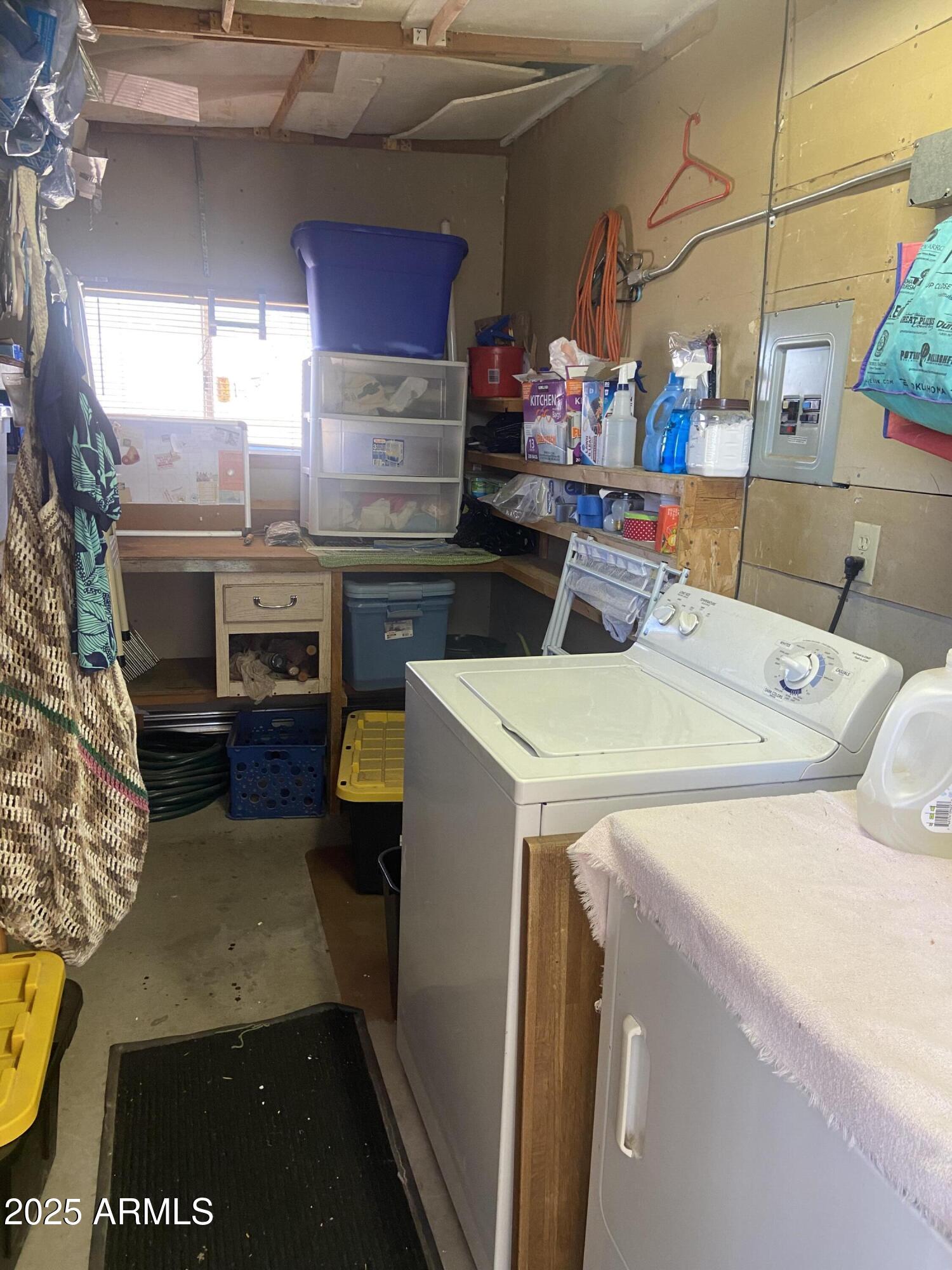 1177 Kiowa Circle Apache Junction, AZ 85119 - Photo 21 of 24 a utility room with dryer and washer