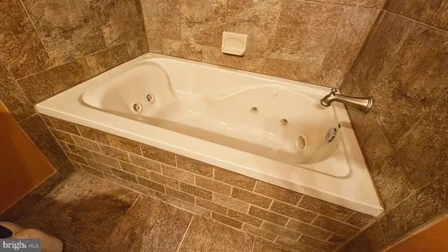 a bathroom with a bathtub