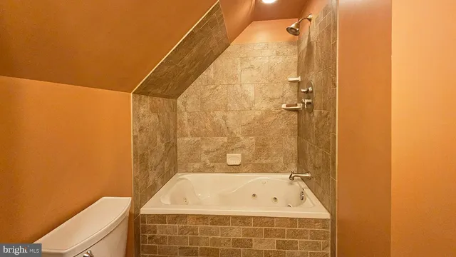 a bathroom with a bathtub