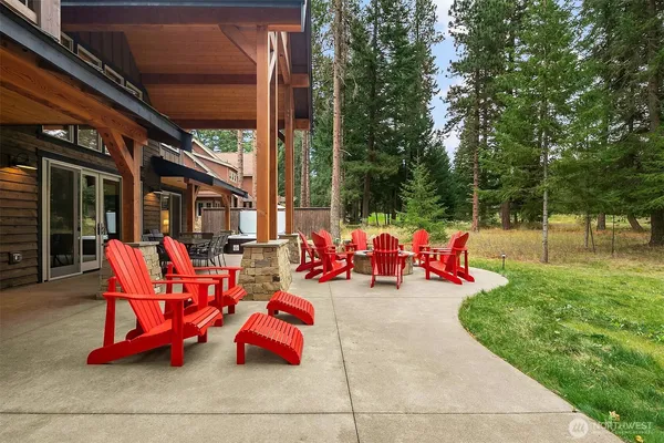 a view of a room with swing hanging chairs