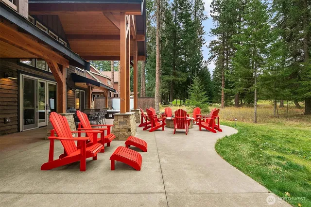 a view of a room with swing hanging chairs