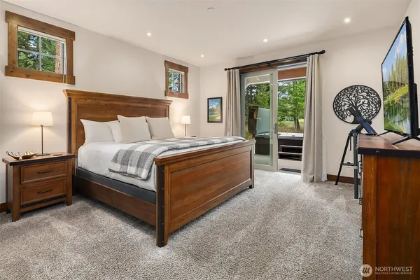 a bed room with a bed and a window