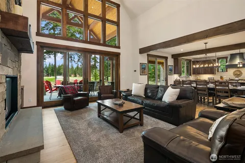 a living room with furniture couches and a flat screen tv