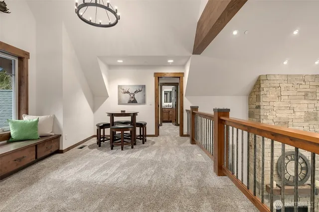 a view of a livingroom with furniture window and wooden floor