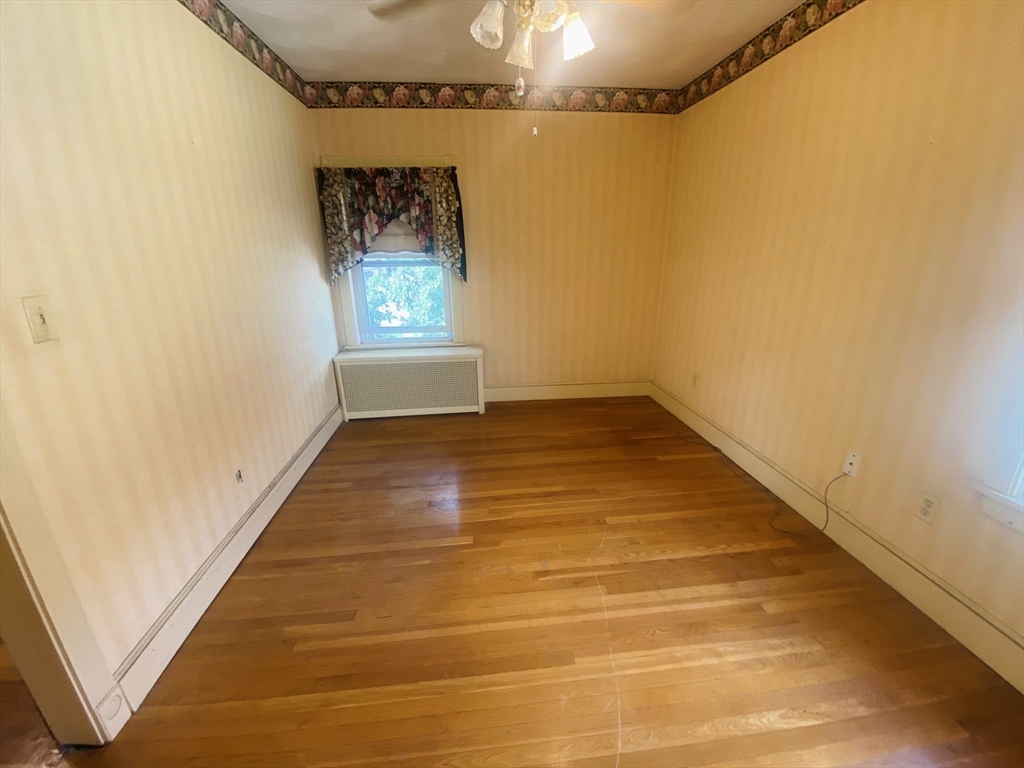 7 River St Place Lynn, MA 01905 - Photo 12 of 16 a view of hallway with stairs
