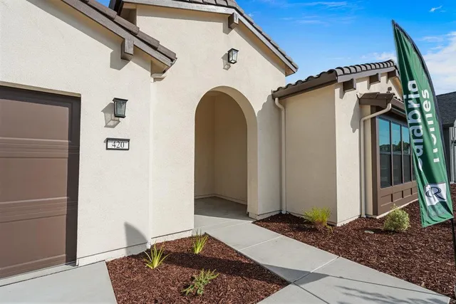 a view of a back yard of the house