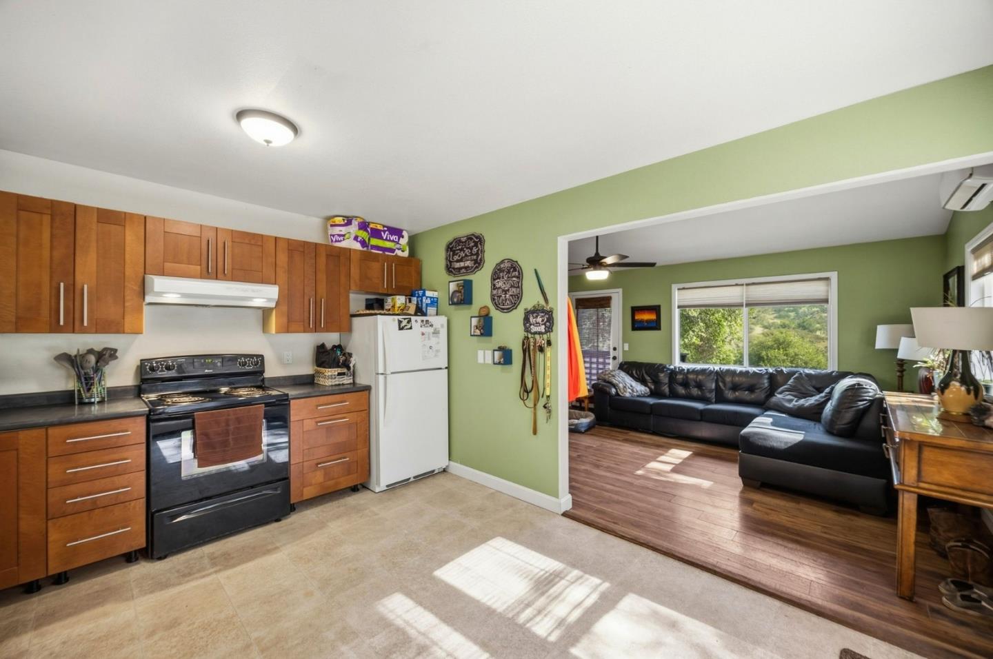 2353 Stagecoach Canyon Road Pope Valley, CA 94567 - Photo 11 of 46 a kitchen with stainless steel appliances granite countertop a refrigerator stove top oven and sink