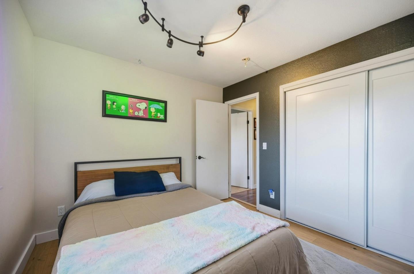 2353 Stagecoach Canyon Road Pope Valley, CA 94567 - Photo 15 of 46 a bedroom with a bed and a table