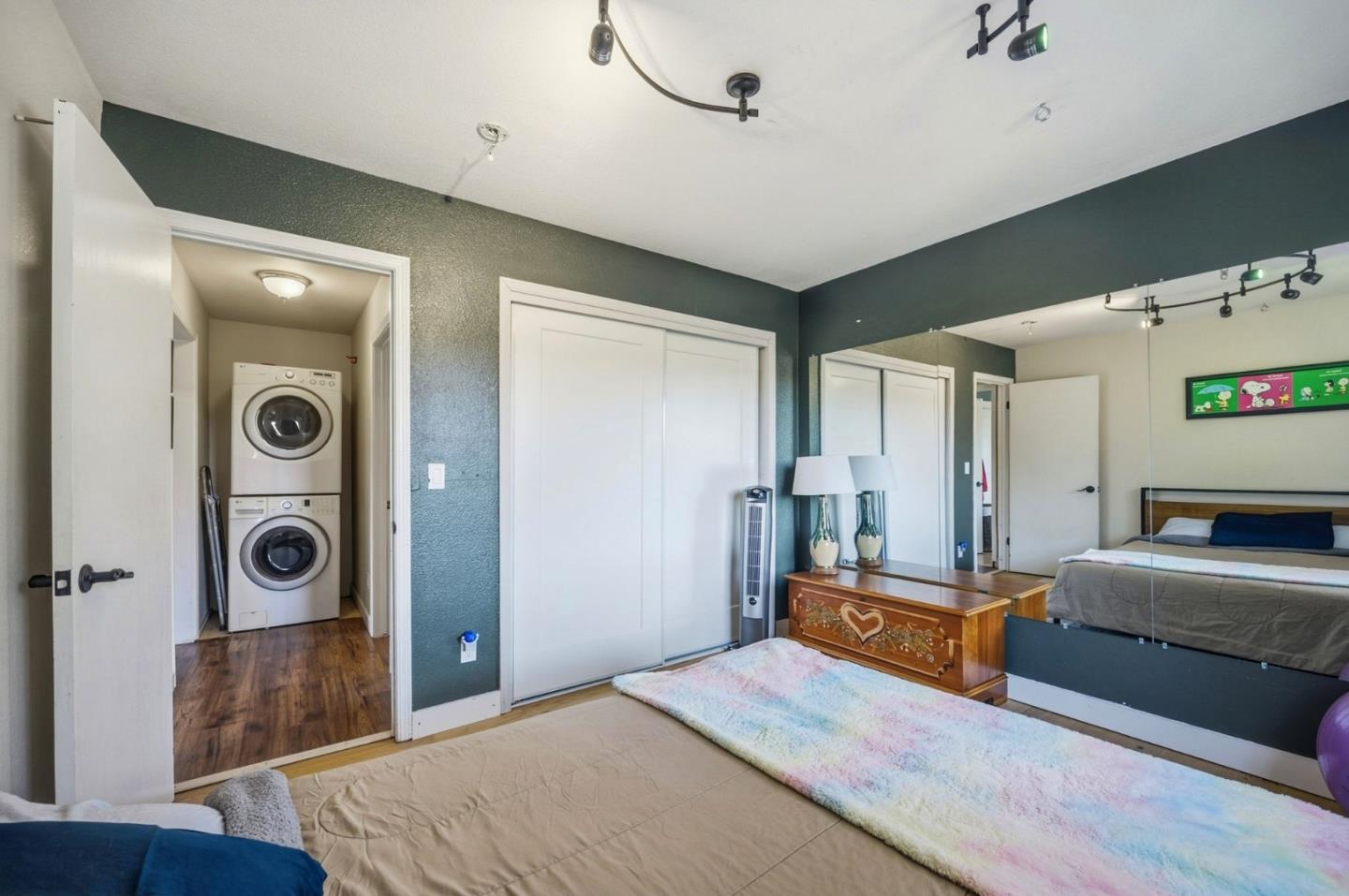 2353 Stagecoach Canyon Road Pope Valley, CA 94567 - Photo 16 of 46 a bedroom with furniture and a rug