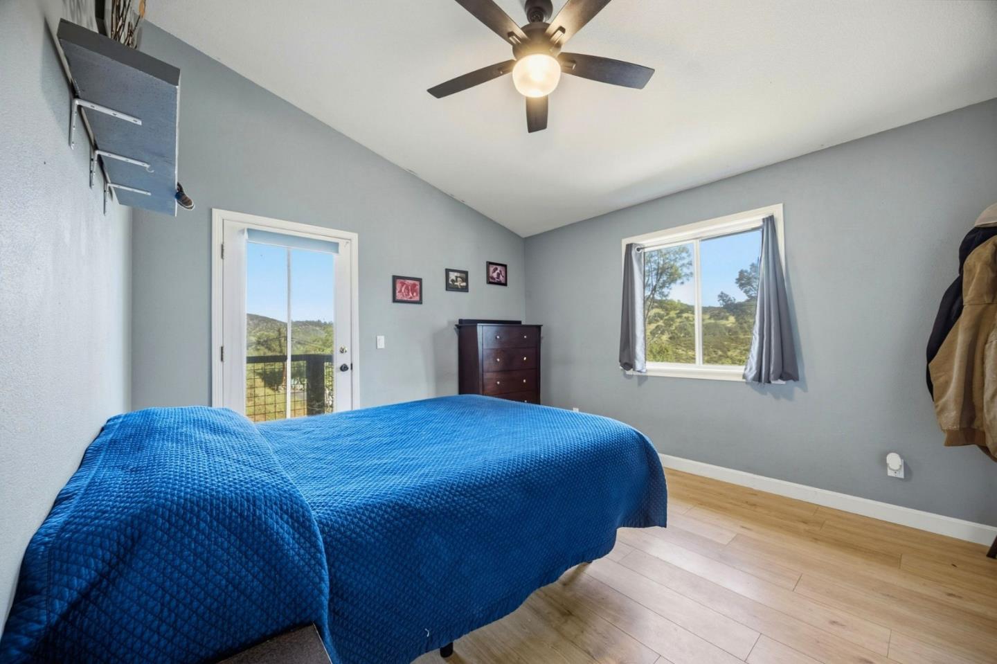 2353 Stagecoach Canyon Road Pope Valley, CA 94567 - Photo 17 of 46 a bedroom with a bed and a flat screen tv