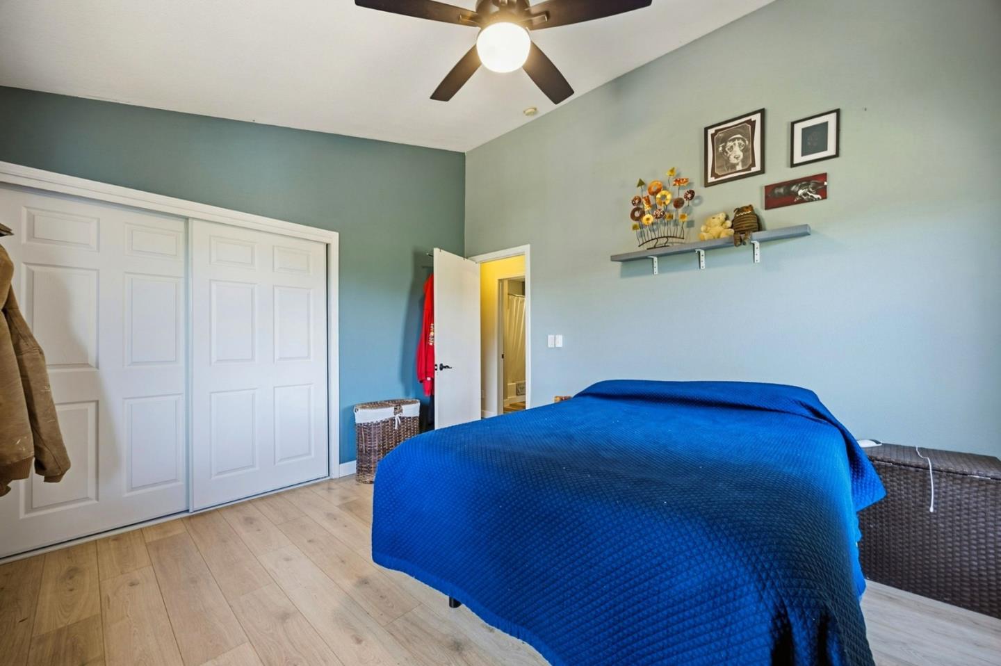 2353 Stagecoach Canyon Road Pope Valley, CA 94567 - Photo 19 of 46 a bedroom with a bed and a flat screen tv