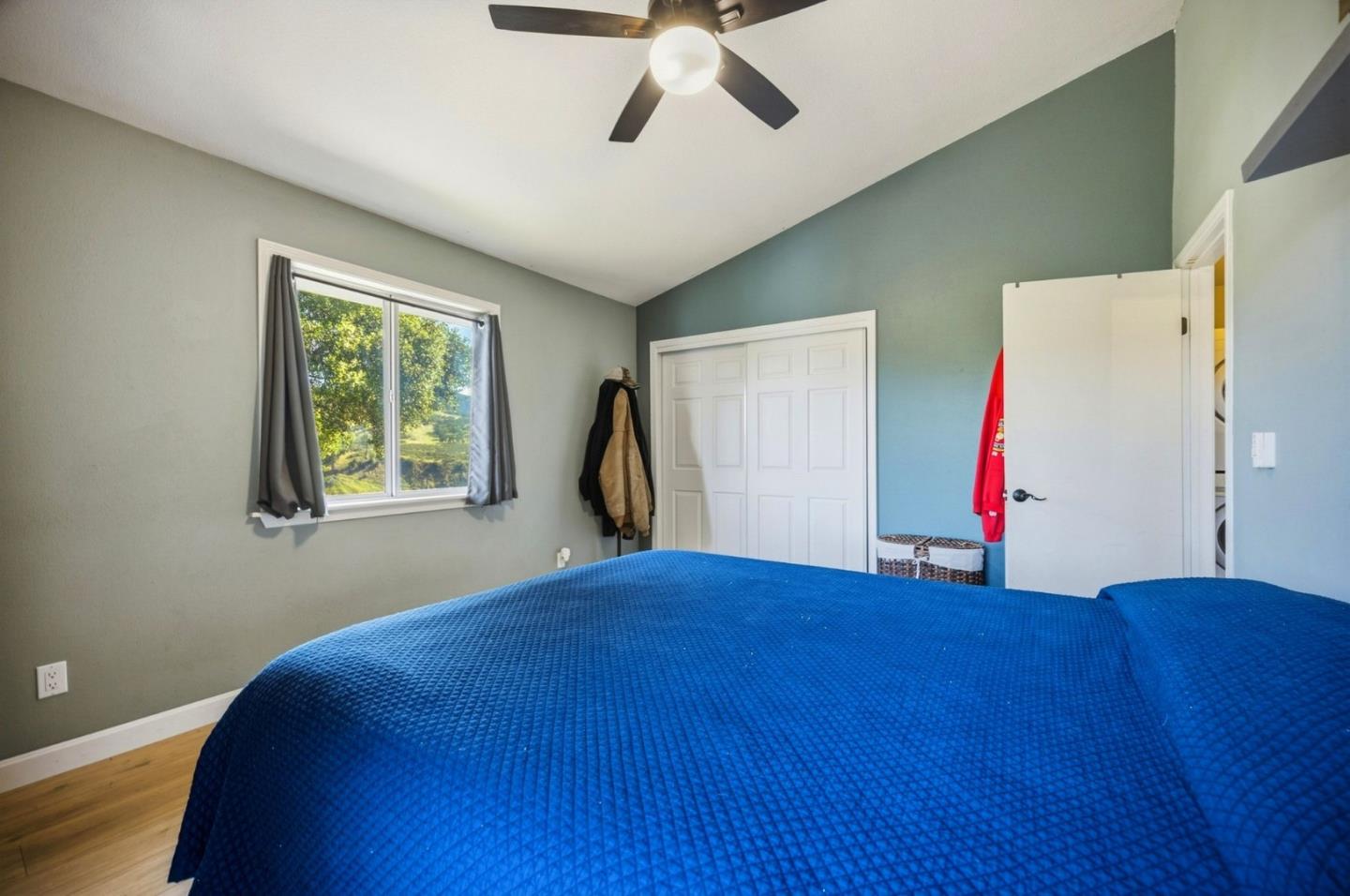 2353 Stagecoach Canyon Road Pope Valley, CA 94567 - Photo 20 of 46 a bedroom with a bed and a window