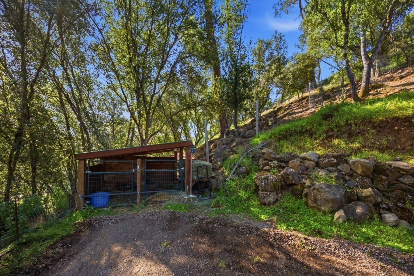 2353 Stagecoach Canyon Road Pope Valley, CA 94567 - Photo 24 of 46 a view of a house with a tree