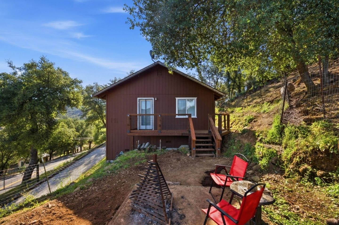 2353 Stagecoach Canyon Road Pope Valley, CA 94567 - Photo 25 of 46 a front view of a house with a yard