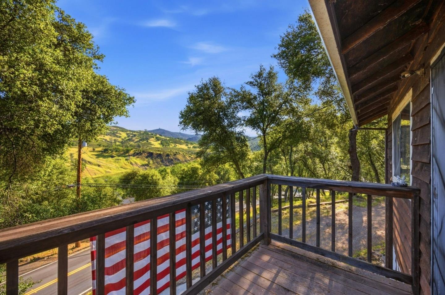 2353 Stagecoach Canyon Road Pope Valley, CA 94567 - Photo 29 of 46 a view of a balcony with wooden fence and floor