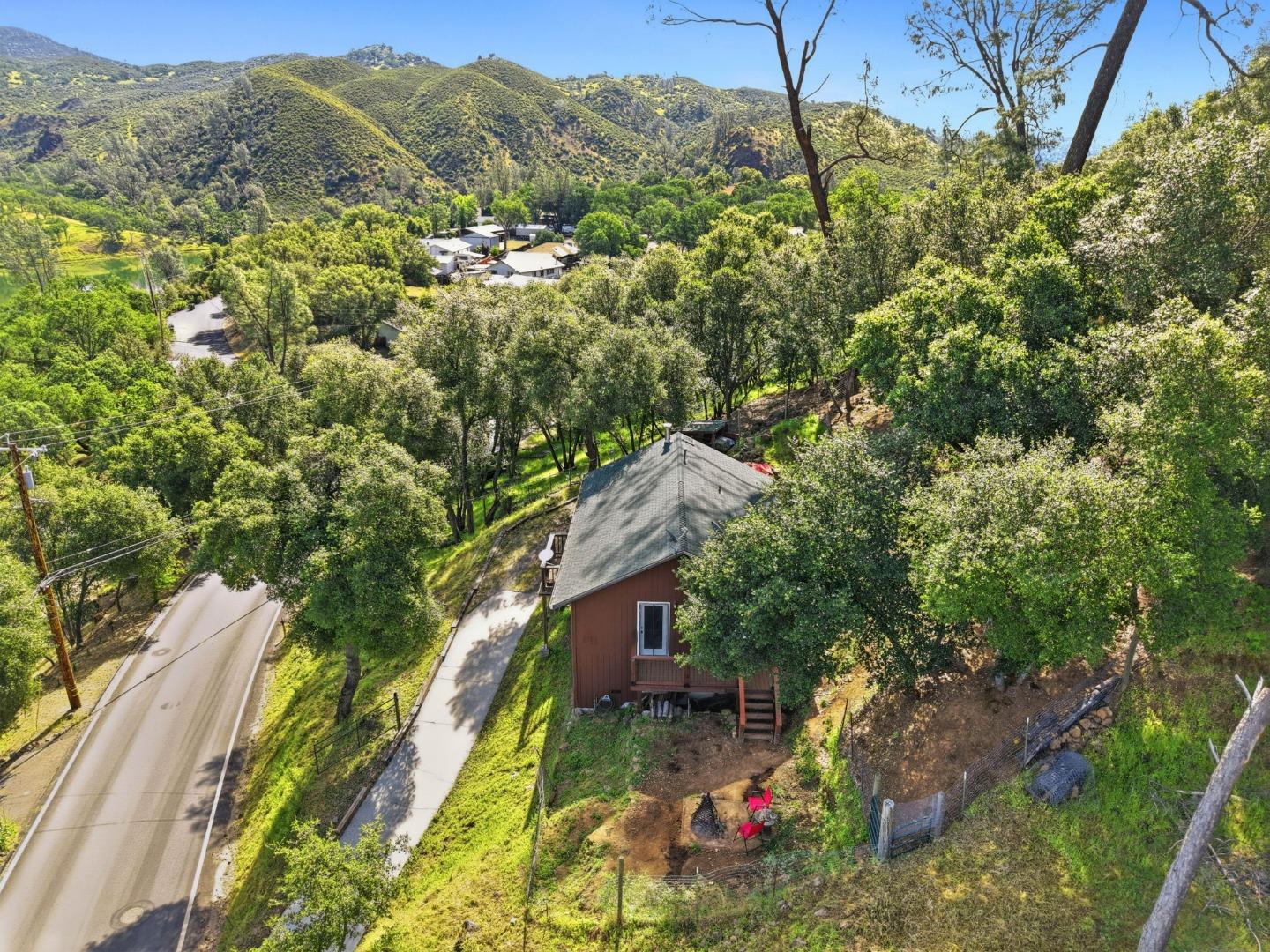 2353 Stagecoach Canyon Road Pope Valley, CA 94567 - Photo 38 of 46 a view of a house with a yard