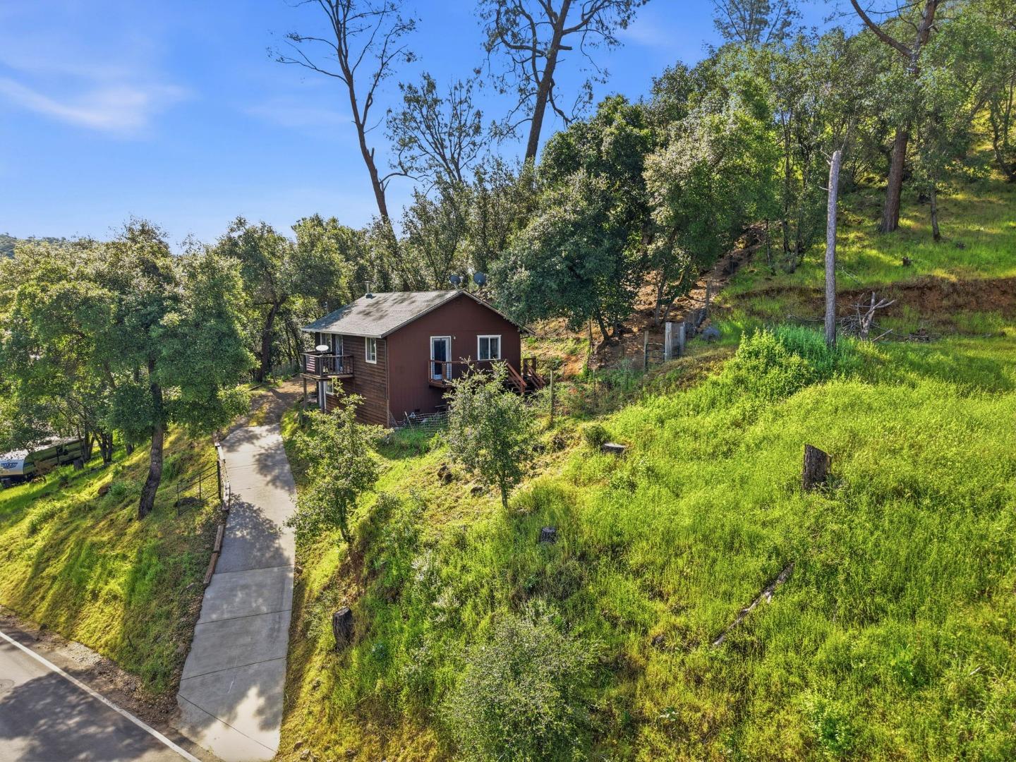 2353 Stagecoach Canyon Road Pope Valley, CA 94567 - Photo 39 of 46 a view of a house with a yard