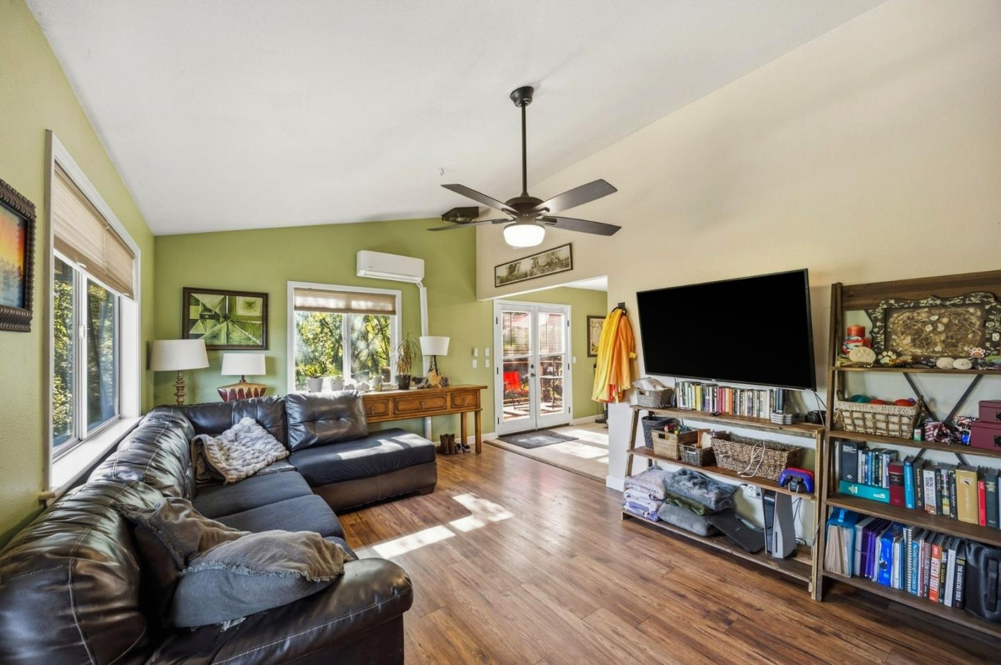 2353 Stagecoach Canyon Road Pope Valley, CA 94567 - Photo 6 of 46 a living room with furniture and a flat screen tv